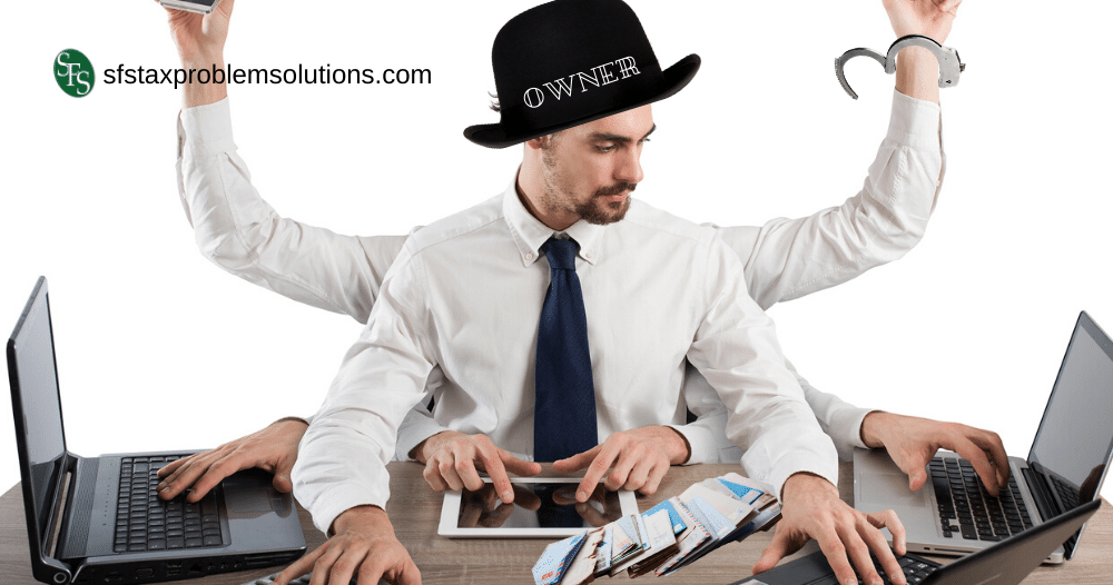 man with multiple hands and hat working on may devices