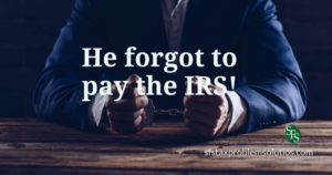 He forgot to pay the IRS- man in handcuffs at table
